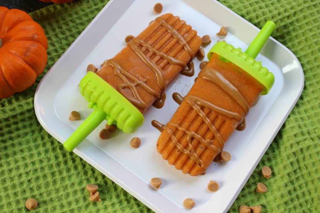Pumpkin spice popsicles are made with a creamy combination of canned pumpkin, Greek yogurt, and all the flavors and spices of fall!