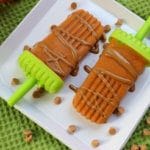 Pumpkin spice popsicles are made with a creamy combination of canned pumpkin, Greek yogurt, and all the flavors and spices of fall!