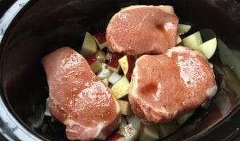 Taste the flavors of fall with slow cooked pork chops, apples, and onions. A delicious set-it and forget-it weeknight meal!