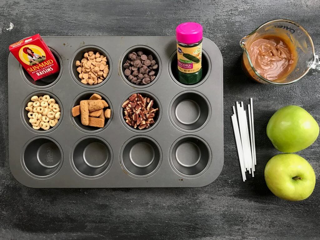 Caramel apple pops are an easy and delicious way to eat a traditional caramel apple. Get the kids involved in topping their own with dried cereal, chocolate chips, or extra caramel sauce!