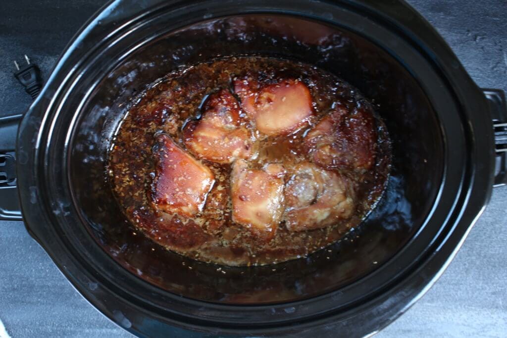 Bring out your slow cooker and pantry staple ingredients for a sweet and spicy sesame chicken thighs recipe! 