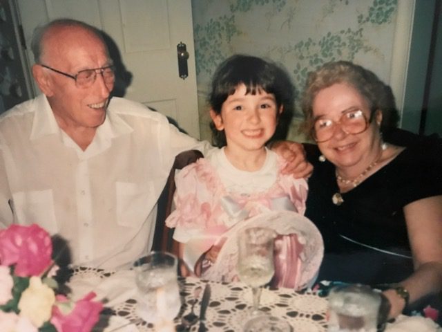 The two that made family meals a priority in our family, my Grandpa and Grandma Caputo---- pictured with a 5-year-old me! 
