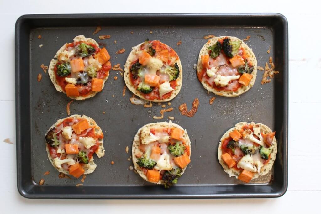 This easy recipe for roasted veggie English muffin pizzas is a great way to get an extra serving of vegetables in your diet, plus an easy idea for weekday lunches!