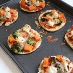 This easy recipe for roasted veggie English muffins pizzas is a great way to get an extra serving of vegetables in your diet, plus an easy idea for weekday lunches!