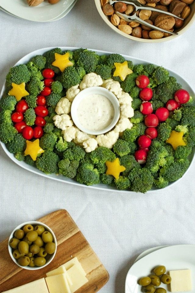 Holiday veggie trays are designed for Thanksgiving and Christmas celebrations. Both healthy and fresh, vegetable trays are perfect for any holiday party!