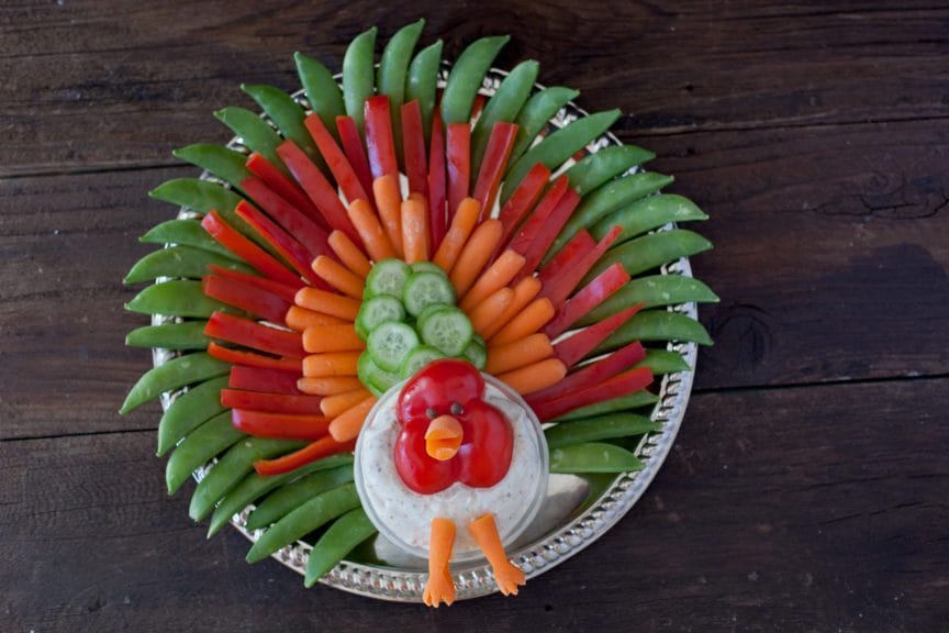 Holiday veggie trays are designed for Thanksgiving and Christmas celebrations. Both healthy and fresh, vegetable trays are perfect for any holiday party!
