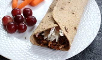 BBQ sauce and coleslaw give lots of crunch and flavor to this Flatout Flatbread BBQ chicken wrap! Perfect for a weekday lunch or simple weeknight dinner.