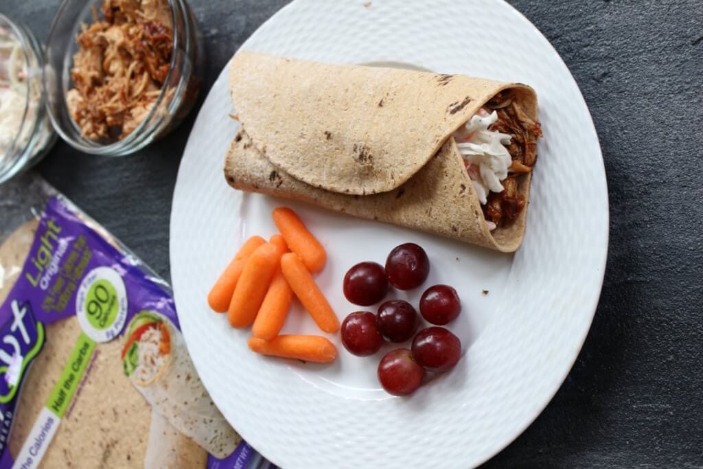 IMG_3399 - Mom to Mom Nutrition BBQ sauce and coleslaw give lots of crunch and flavor to this Flatout Flatbread BBQ chicken wrap! Perfect for a weekday lunch or simple weeknight dinner.