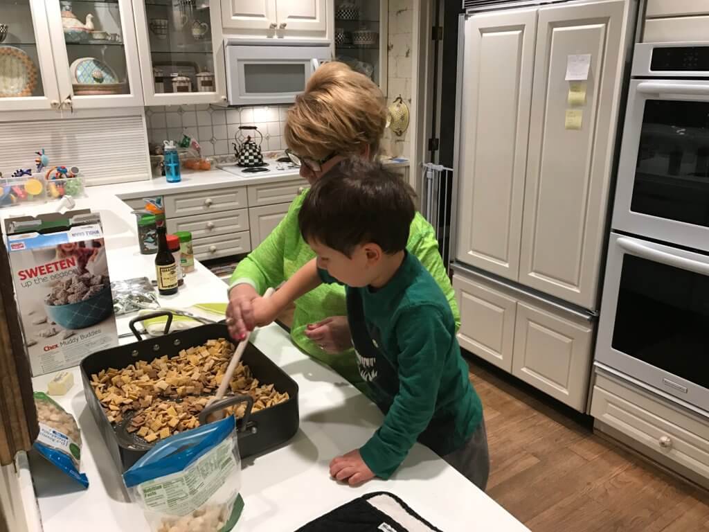 IMG_8270 - Mom to Mom Nutrition From unloading groceries, washing produce or grating cheese, here are 8 fun and interactive ways toddlers can help in the kitchen.