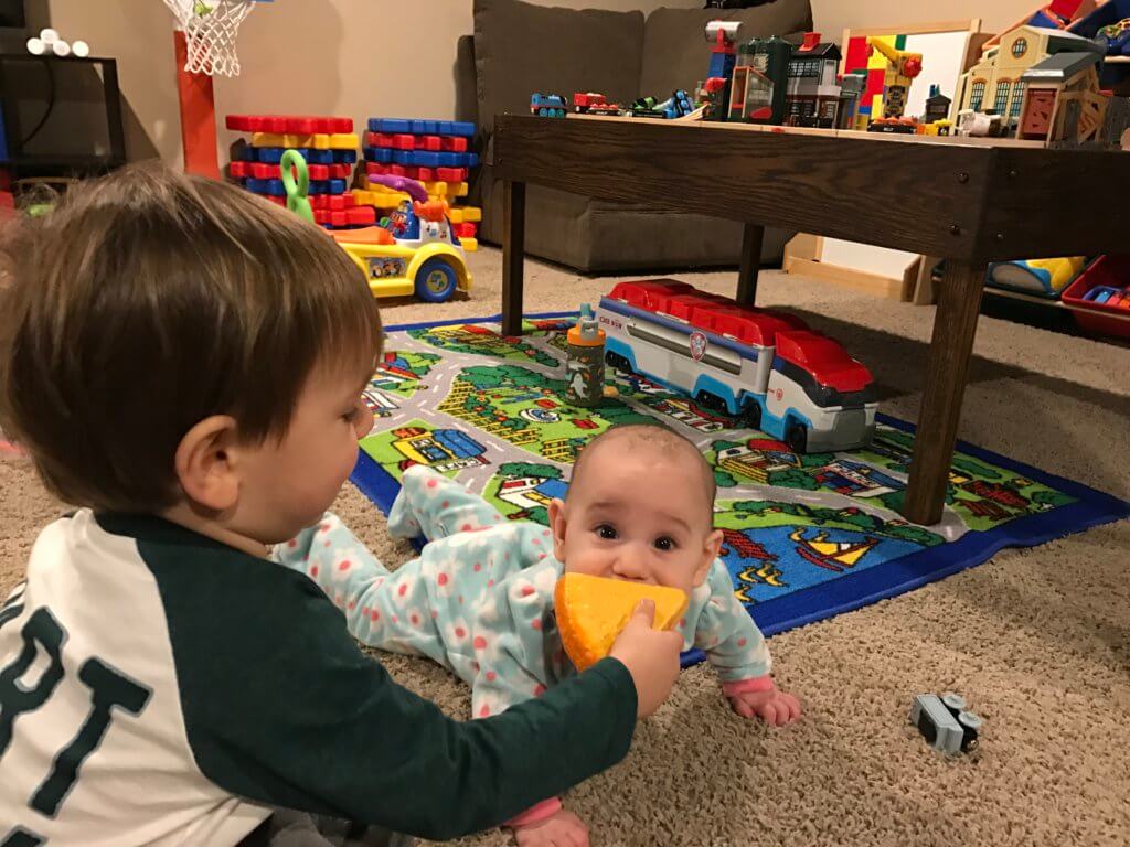 IMG_8372 - Mom to Mom Nutrition From unloading groceries, washing produce or grating cheese, here are 8 fun and interactive ways toddlers can help in the kitchen.