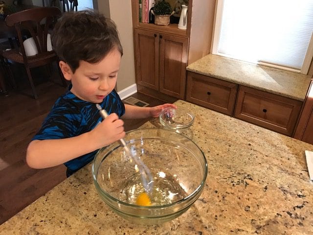 IMG_8515 - Mom to Mom Nutrition From unloading groceries, washing produce or grating cheese, here are 8 fun and interactive ways toddlers can help in the kitchen.