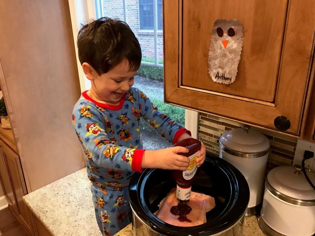 IMG_8548.JPG - Mom to Mom Nutrition From unloading groceries, washing produce or grating cheese, here are 8 fun and interactive ways toddlers can help in the kitchen.