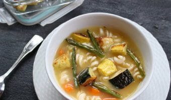 Cook once and dine twice with a big batch of roasted vegetables. And make the most of the leftovers by adding them to a simple chicken soup!