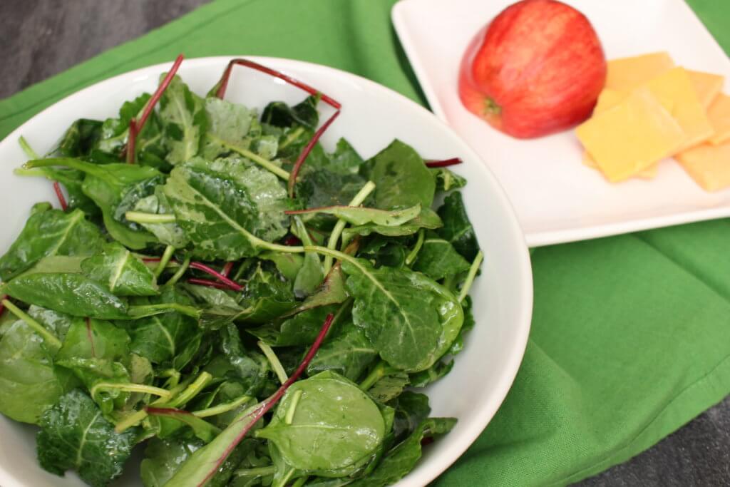 IMG_3428 - Mom to Mom Nutrition Kale salad gets a sweet and savory makeover with apples and cheddar cheese. A simple side dish or main paired alongside grilled chicken.