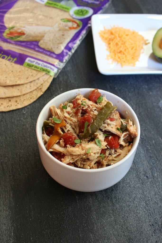 Bring out your slow cooker for a full-of-flavor chicken fajitas dinner, made with lots of fresh vegetables and your favorite fajitas toppings. 