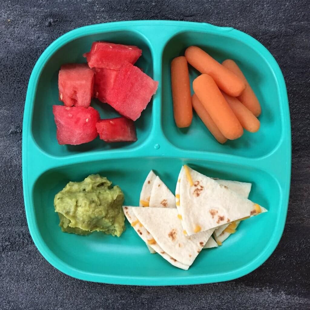 Taco stuffed sweet potatoes combine your favorite taco toppings with a nutritious sweet potato as a healthy base! Make this meal even quicker by cooking the sweet potatoes ahead of time. When it comes to weekly meal planning, we almost always have a taco-esc themed dinner night. So, whether that’s oven baked tacos, taco salads, or taco stuffed sweet potatoes, I’m bringing out the lean Ground Beef, some taco seasoning, and lots of cheese. Because the boys will demand cheese melted on a mini-tortilla when they realize it’s taco night! If you haven’t already guessed it, these taco stuffed sweet potatoes were thoroughly enjoyed by Ted and I. The boys? Eh. Like I said, they wanted cheese melted on a tortilla [in the microwave--- so gourmet!]. Anthony had some of the beef and a few bites of my sweet potato. Joey? He definitely had his fair share of melted cheese. That doesn’t mean your two or three-year-old won’t like taco stuffed sweet potatoes. I’m just giving you a heads-up to have some tortillas on hand for those that want carbs from a tortilla vs. a sweet potato. Can you blame them?! 