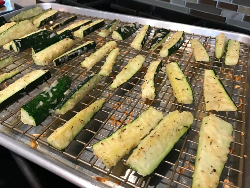 IMG_8910 - Mom to Mom Nutrition Parmesan zucchini sticks are baked to perfection and full of cheesy parmesan flavor. A simple side dish or appetizer, served best with marinara sauce for dipping.