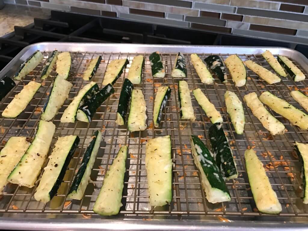 IMG_8912 - Mom to Mom Nutrition Parmesan zucchini sticks are baked to perfection and full of cheesy parmesan flavor! A simple side dish or appetizer, served best with marinara sauce for dipping!