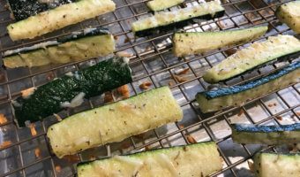 Parmesan zucchini sticks are baked to perfection and full of cheesy parmesan flavor! A simple side dish or appetizer, served best with marinara sauce for dipping!