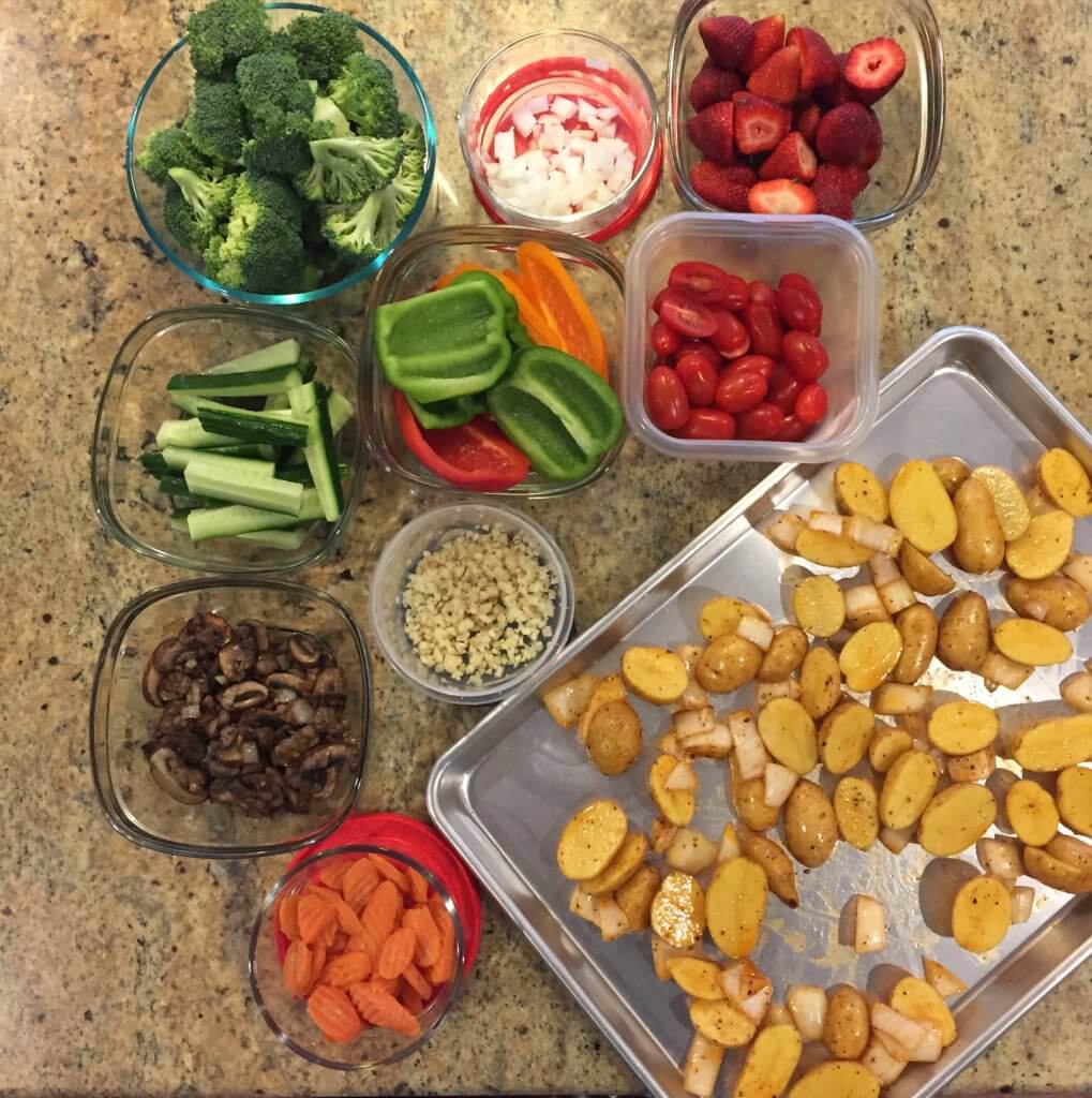 Produce prep is one way I make sure my family eats a variety of fruits and vegetables each week. One hour of washing and chopping produce each week helps with meal and snacks! 