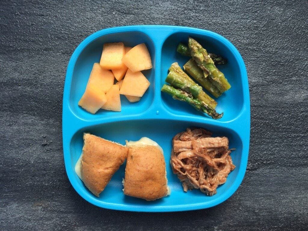 IMG_6849 - Mom to Mom Nutrition Lemony asparagus with garlic and parmesan is a quick and easy side dish, served with fresh lemon slices for a bright, spring recipe!