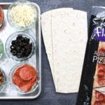 Pizza for dinner, again? Yes! Change-up your weekly pizza routine with a build your own pizza bar for dinner! The best part? The kids can make their own.