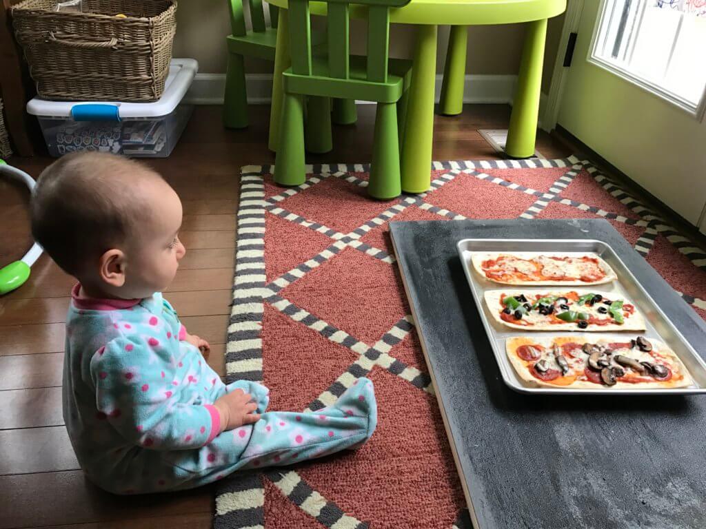 Pizza for dinner, again? Yes! Change-up your weekly pizza routine with a build your own pizza bar for dinner! The best part? The kids can make their own.