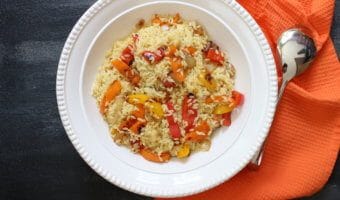 Orzo salad with bell peppers and garlic dressing is the perfect side dish for any summer BBQ or weeknight meal. Fresh bell peppers and a store bought dressing pack a punch of flavor!