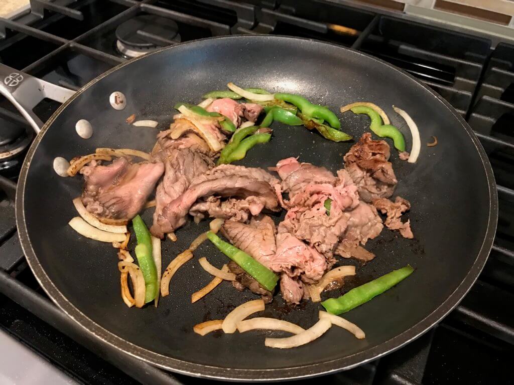 Take your deli sandwich game to the next level by making this beefy, cheesy roast beef hoagie with melted provolone cheese! 