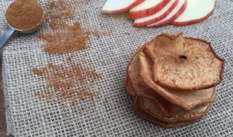 Baked apple chips make a nutritious and crunchy snack. All you need is two-ingredients, then slice, sprinkle, and bake!  