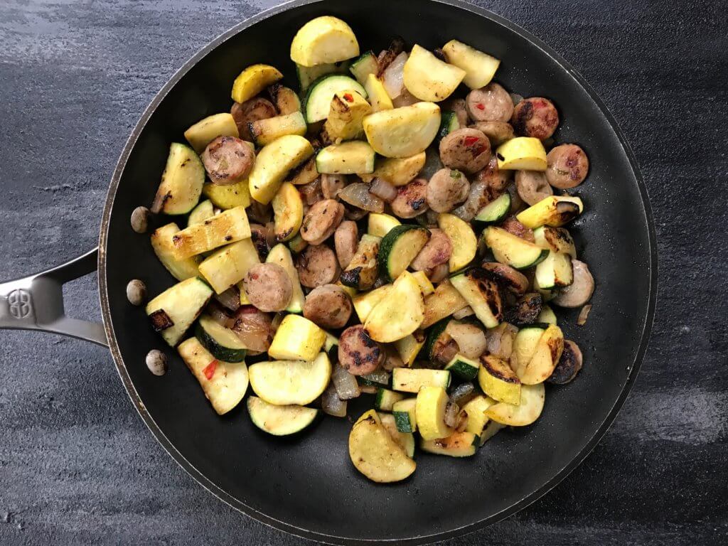 Ready in just 15 minutes, chicken sausage and fresh vegetables come together in a super simple chicken sausage and vegetable skillet dinner recipe.