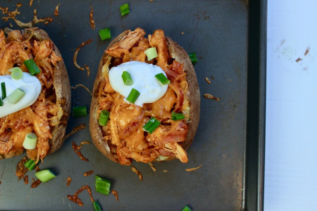 BBQ Chicken Stuffed Baked Potatoes bring together tender bites of chicken mixed with one fluffy baked potato for a simple weeknight meal.