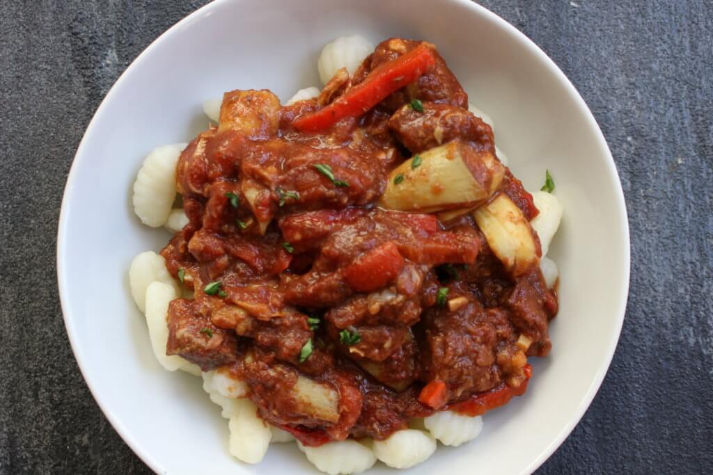 A simple rustic slow cooker Mediterranean beef recipe which includes Mediterranean flavors like basil and oregano, and tender beef that will fall apart in your mouth!