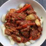 A simple rustic slow cooker Mediterranean beef recipe which includes Mediterranean flavors like basil and oregano, and tender beef that will fall apart in your mouth!