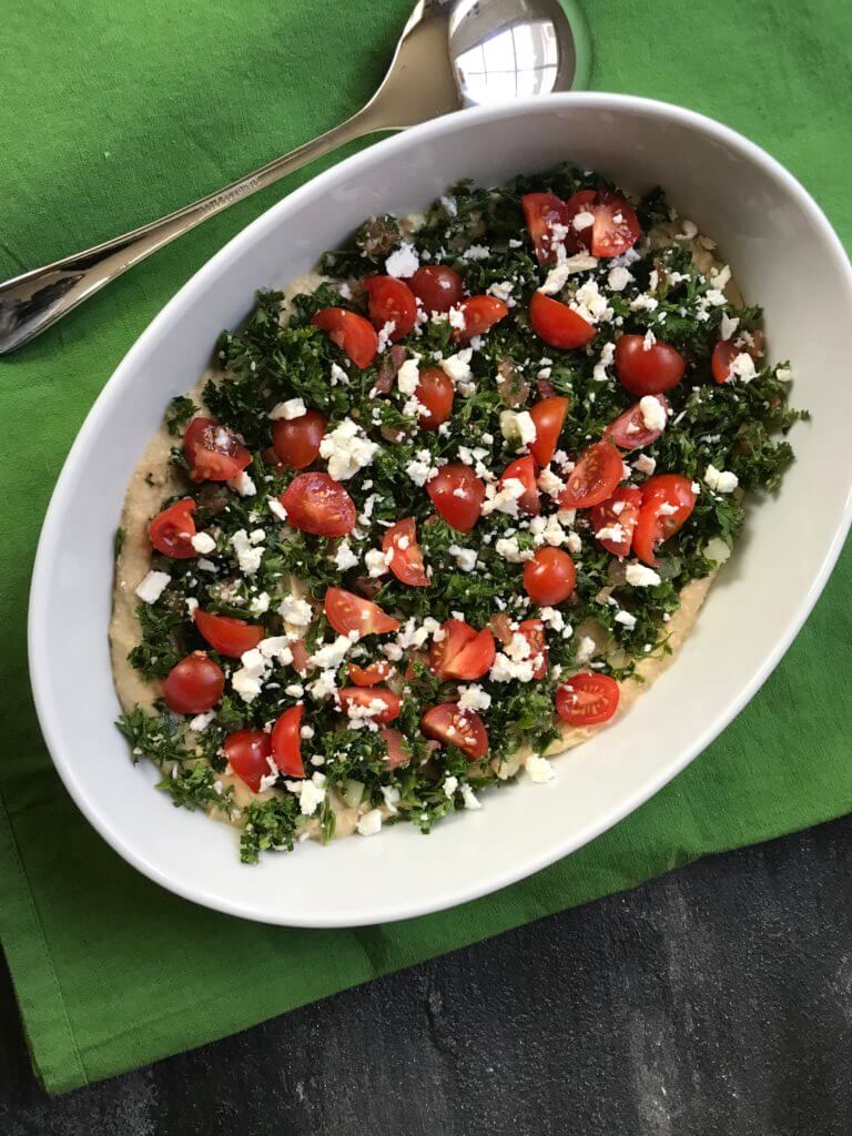 This Mediterranean Layer Hummus Dip is a fresh and healthy appetizer that is the perfect dish to pass at any party! 