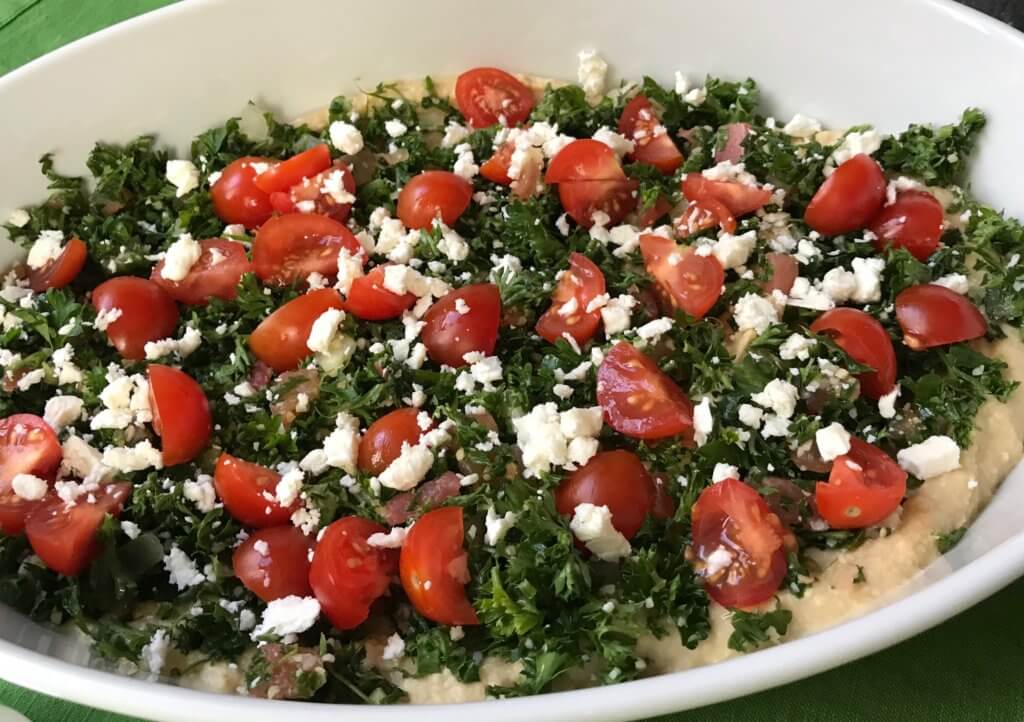 This Mediterranean Layer Hummus Dip is a fresh and healthy appetizer that is the perfect dish to pass at any party! 