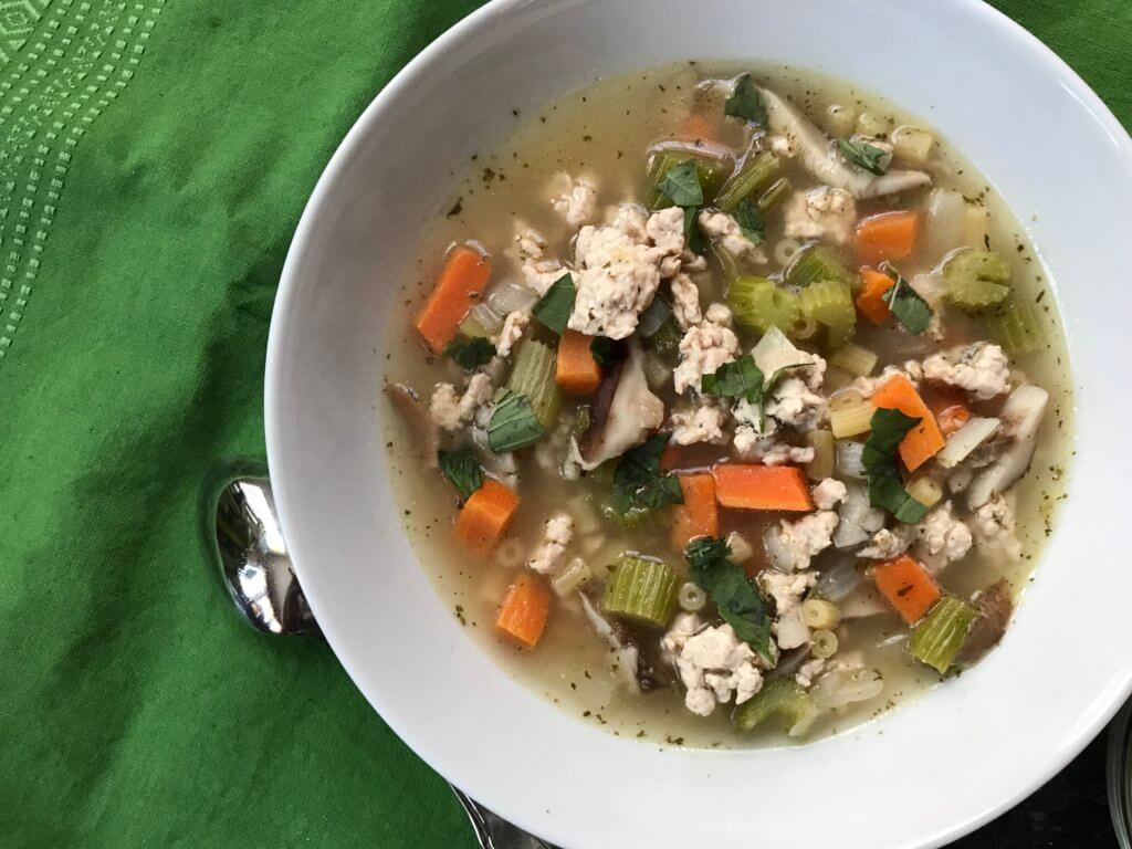 IMG_0801 - Mom to Mom Nutrition This one-pot Pesto Turkey Noodle Soup is the perfect way to warm up with a hearty, veggie-packed meal. The addition of pesto and swap of ground turkey is a delicious twist on the classic chicken noodle!