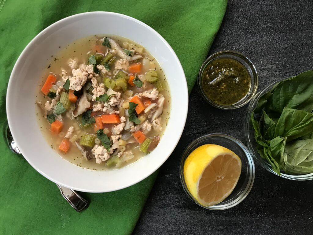 IMG_0803-1 - Mom to Mom Nutrition This one-pot Pesto Turkey Noodle Soup is the perfect way to warm up with a hearty, veggie-packed meal. The addition of pesto and swap of ground turkey is a delicious twist on the classic chicken noodle!