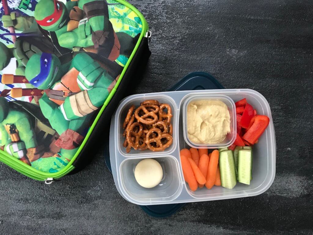 Pack your favorite flavored hummus + crunchy veggies for a healthy school hummus lunchbox.