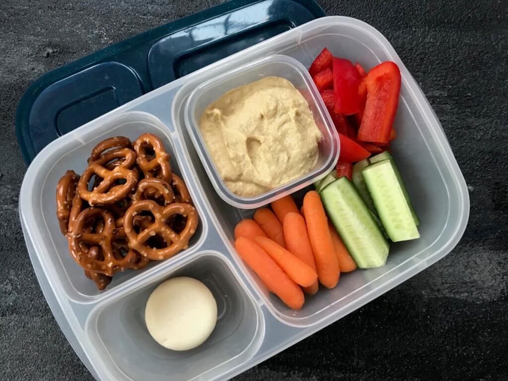 Pack your favorite flavored hummus + crunchy veggies for a healthy school hummus lunchbox.