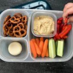 Pack your favorite flavored hummus + crunchy veggies for a healthy school hummus lunchbox.
