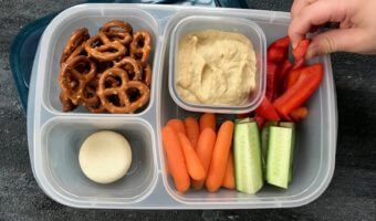 Pack your favorite flavored hummus + crunchy veggies for a healthy school hummus lunchbox.