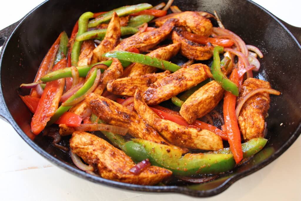 Skillet Chili-Lime Chicken Fajitas are a fast, fresh, and flavorful recipe that you can have on your dinner table in under 30 minutes!