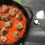 A classic meatball recipe gets a flavor-punch with extra Parmesan cheese in these easy baked Parmesan meatballs.