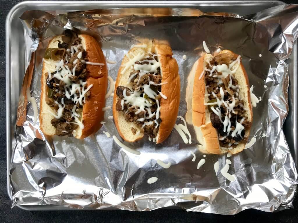 Slow Cooker Ground Beef Hoagies are the perfect melt-in-your-mouth sandwich made with lean beef, lots of veggies, and the ease of your slow cooker.