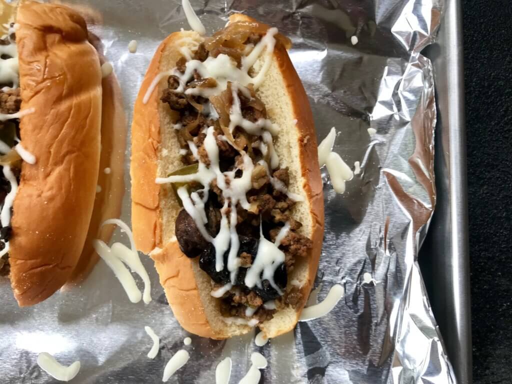 Slow Cooker Ground Beef Hoagies are the perfect melt-in-your-mouth sandwich made with lean beef, lots of veggies, and the ease of your slow cooker.