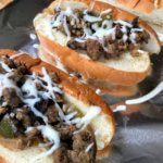 Slow Cooker Ground Beef Hoagies are the perfect melt-in-your-mouth sandwich made with lean beef, lots of veggies, and the ease of your slow cooker.