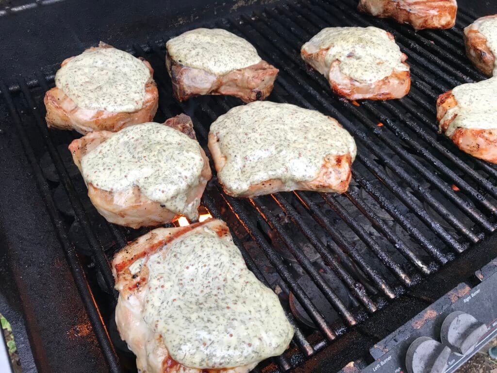 IMG_1699 - Mom to Mom Nutrition Grilled pork chops with lemon dill sauce make a delicious main for any BBQ or outdoor gathering. Fresh, fast, and simple, the sauce is what makes the pork extra moist!