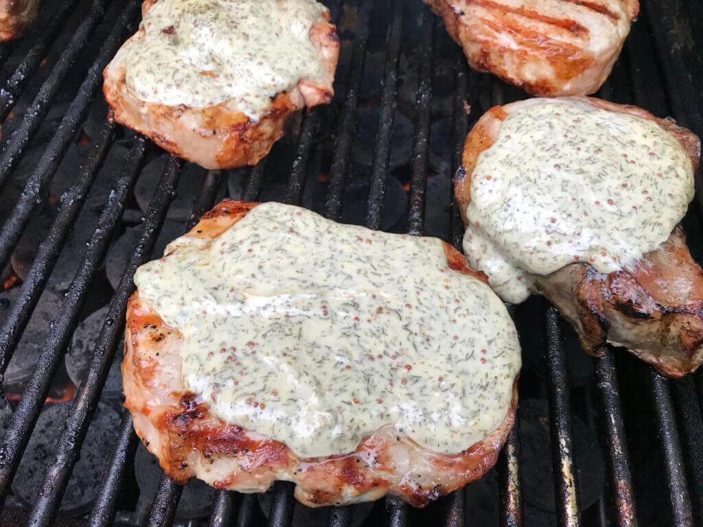 IMG_1700 - Mom to Mom Nutrition Grilled pork chops with lemony dill sauce make a delicious main for any BBQ or outdoor gathering. Fresh, fast, and simple, the sauce is what makes the pork extra moist!