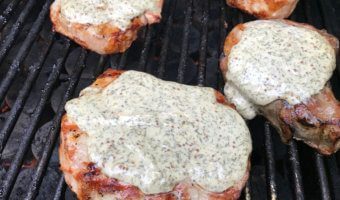 Grilled pork chops with lemony dill sauce make a delicious main for any BBQ or outdoor gathering. Fresh, fast, and simple, the sauce it what makes the pork extra moist!
